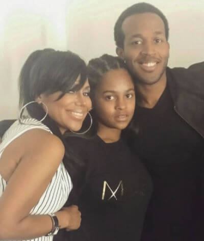 Marcel Young with his younger sister Bailie and mom Michel'le.